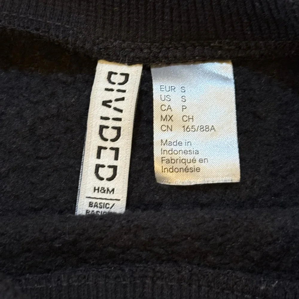 H&M divided black